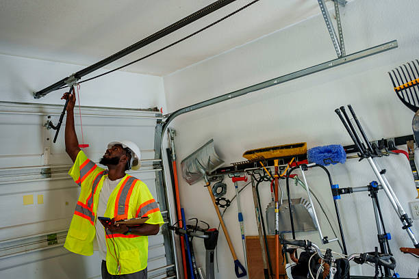 Professional Garage Door Panel Replacement technician working in Connersville, IN